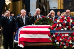 WASHINGTON, DC - DECEMBER 4:  Former Chairman of the Joint Chiefs of Staff and former Secretary of State Colin Powell (C) and former military officials from the Gulf War salute the casket of the late former President George H.W. Bush as he lies in state at the U.S. Capitol, December 4, 2018 in Washington, DC. A WWII combat veteran, Bush served as a member of Congress from Texas, ambassador to the United Nations, director of the CIA, vice president and 41st president of the United States. Bush will lie in state in the U.S. Capitol Rotunda until Wednesday morning. (Photo by Drew Angerer/Getty Images)