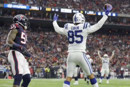 HOUSTON, TX - DECEMBER 09:  Eric Ebron #85 of the Indianapolis Colts celebrates a touchdown reception against the Houston Texans in the second quarter at NRG Stadium on December 9, 2018 in Houston, Texas.  (Photo by Tim Warner/Getty Images)