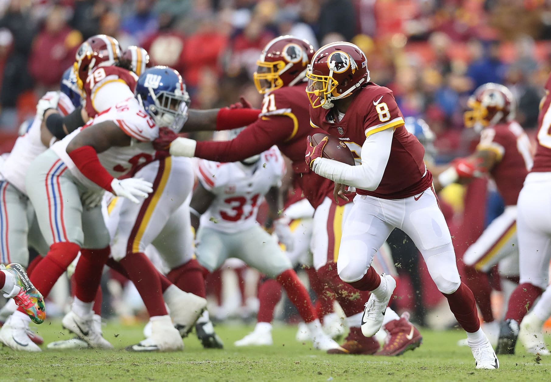 LANDOVER, MD - DECEMBER 09: Quarterback Josh Johnson #8 of the Washington Redskins carries the ball in the fourth quarter against the New York Giants at FedExField on December 9, 2018 in Landover, Maryland. (Photo by Rob Carr/Getty Images)