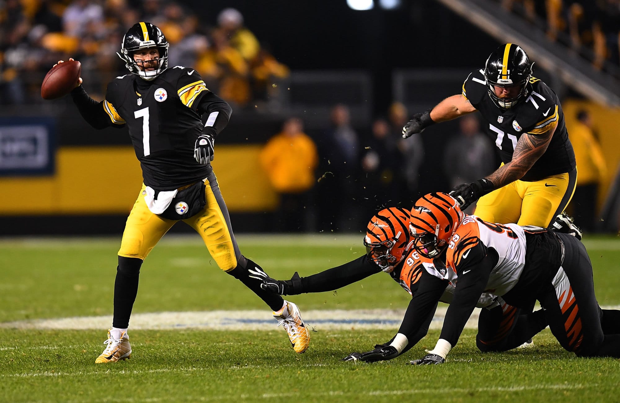 PITTSBURGH, PA - DECEMBER 30: Ben Roethlisberger #7 of the Pittsburgh Steelers attempts a pass under pressure in the second half during the game against the Cincinnati Bengals at Heinz Field on December 30, 2018 in Pittsburgh, Pennsylvania. (Photo by Joe Sargent/Getty Images)