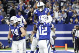 INDIANAPOLIS, INDIANA - DECEMBER 23: Chester Rogers #80 and Andrew Luck #12 of the Indianapolis Colts celebrate after a touch down in the game against the New York Giants in the fourth quarter at Lucas Oil Stadium on December 23, 2018 in Indianapolis, Indiana. (Photo by Joe Robbins/Getty Images)