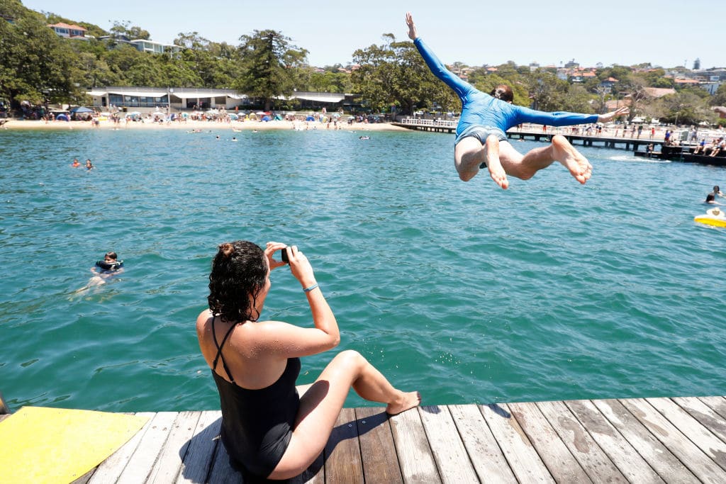 SYDNEY, AUSTRALIA - DECEMBER 26: Sydneysiders enjoy warm weather at Balmoral Beach on December 26, 2018 in Sydney, Australia. Sydney residents are enjoying a hot Christmas break, with temperatures reaching 29 degrees Celsius on Christmas Day and Boxing Day. (Photo by Hanna Lassen/Getty Images)