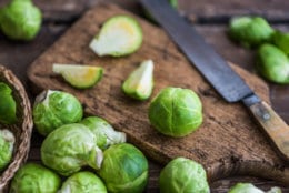 Fresh Brussels Sprouts on a Cutting Board
