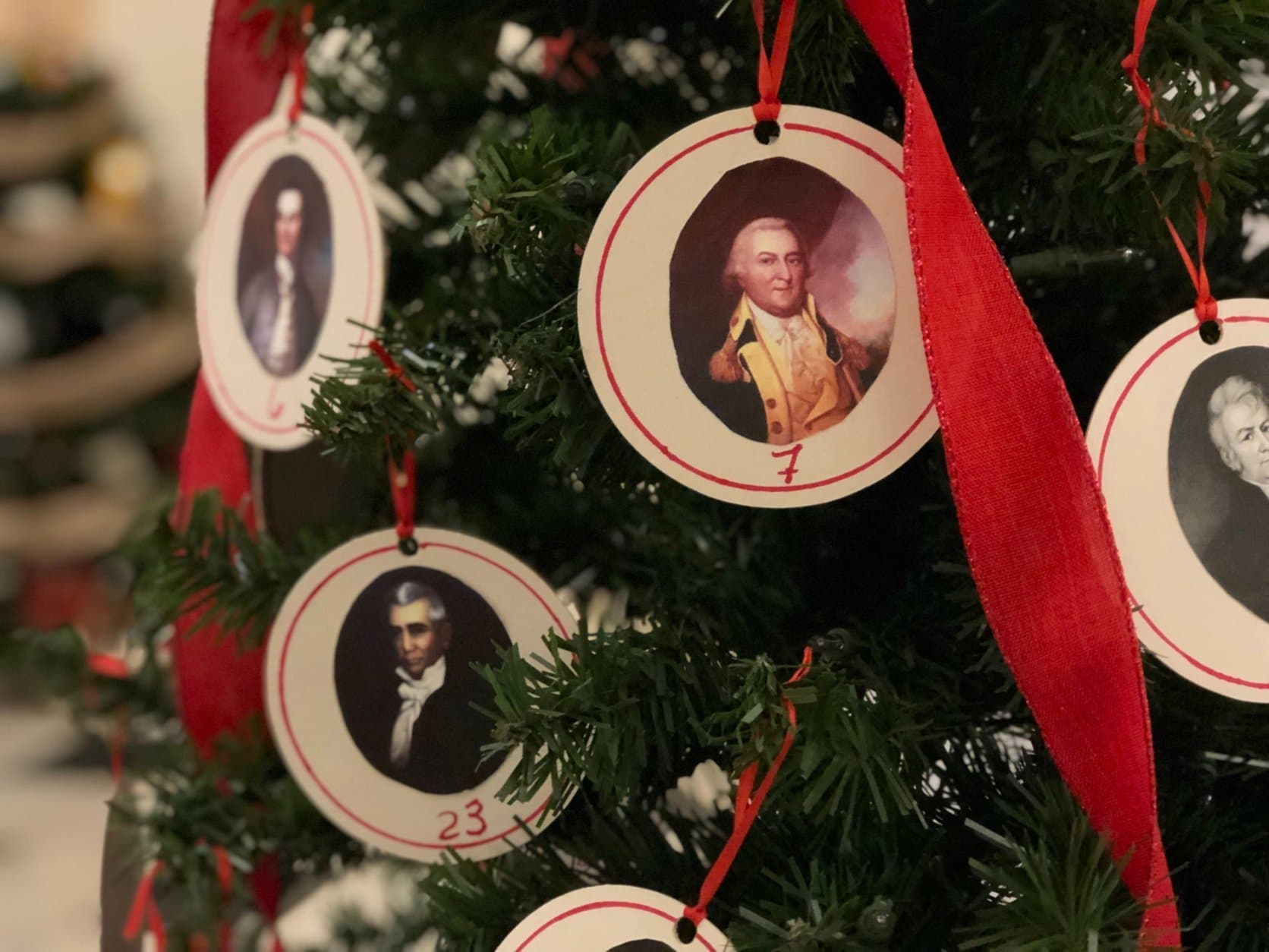 The governors of Maryland are featured on this tree decorated by the Chestertown Garden Club, part of a display of Christmas trees on view at the Maryland State House in Annapolis, Md. (WTOP/Kate Ryan)
