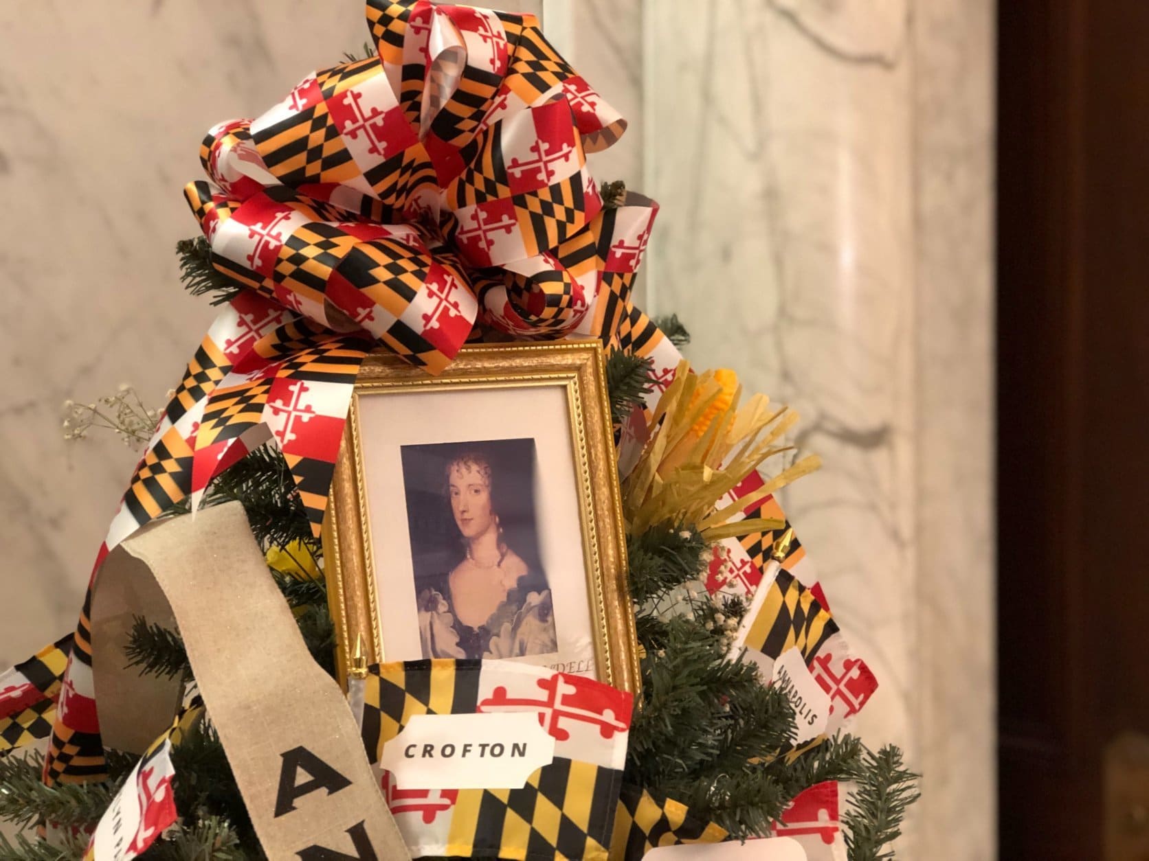 Anne Arundel isn’t just the name of a county in Maryland — it’s the name of an English noblewoman who married Cecil Calvert, second Lord Baltimore. Her name is sometimes spelled “Arundel.” She’s pictured here in an Anne Arundel County-themed Christmas tree on view at Maryland’s State House in Annapolis, Md. (WTOP/Kate Ryan)