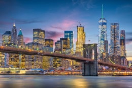 New York City, USA skyline on the East River with Brooklyn Bridge at dusk. (Getty Images/iStockphoto/Sean Pavone) 