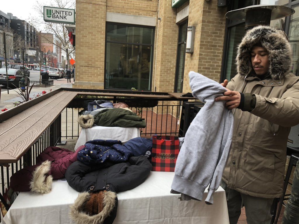 Got a spare coat to donate? The 8th Annual Warming Hearts Drive is on at Bin 1301 Wine Bar on U street. (WTOP/Melissa Howell)