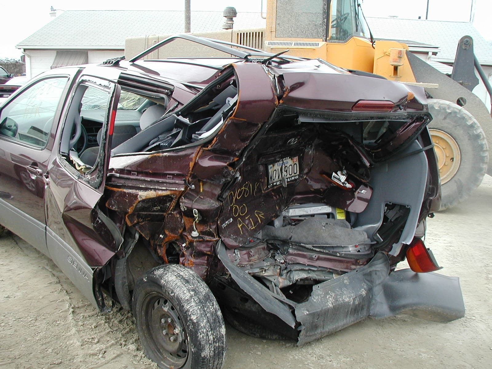 The minivan the Lang family was riding in on Nov. 27, 2001, when a reckless driver rear-ended their minivan, crushing the back half of the vehicle like an accordion. (Courtesy/ Kelly Lang)