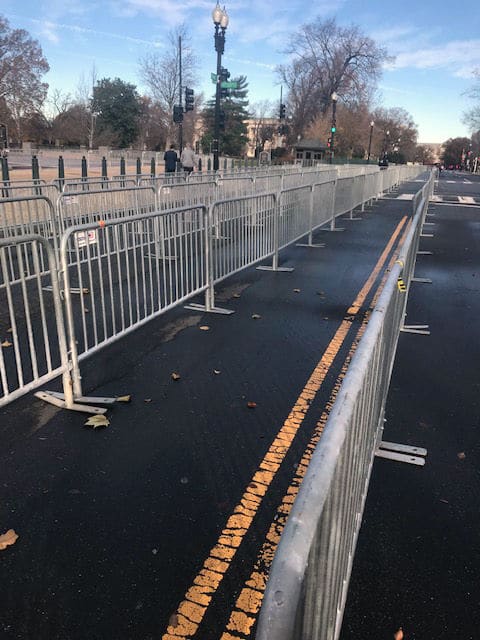 Barricades are set up along the east side of the Capitol for people as they line up to pay their respects to the late George H.W. Bush. (WTOP/Mitchell Miller)