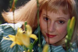 FILE - In this Nov. 1, 1997 file photo, actress/director/author Sondra Locke poses for a photograph at a garden in Beverly Hills, Calif. A death certificate obtained by The Associated Press shows Oscar-nominated actress Locke died Nov. 3, 2018, at age 74 at her home in Los Angeles of cardiac arrest stemming from breast and bone cancer. She was nominated for an Academy Award for best supporting actress for 1968's "The Heart is a Lonely Hunter," her first film. (AP Photo/ Damian Dovarganes, File)