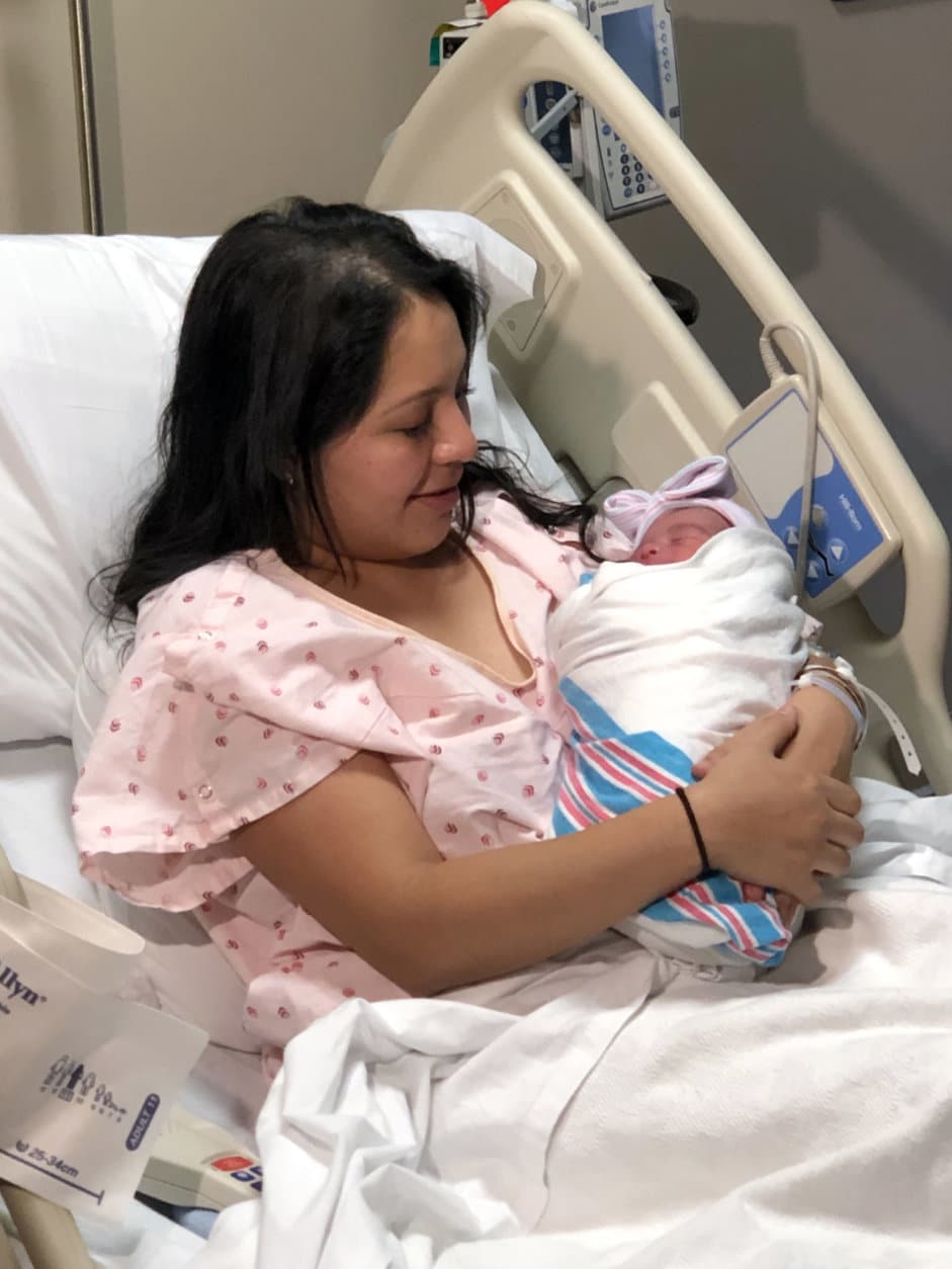 Julie Palancia holds newborn daughter Meilani Morales. (Courtesy Adventist HealthCare Shady Grove Medical Center)