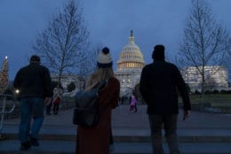 The Capitol is seen as New Year's Day comes to a close with the partial government shutdown in its second week, in Washington, Tuesday, Jan. 1, 2019. The new House majority led by Democrat Nancy Pelosi gavels into session this week with legislation ready to end the government shutdown. (AP Photo/J. Scott Applewhite)