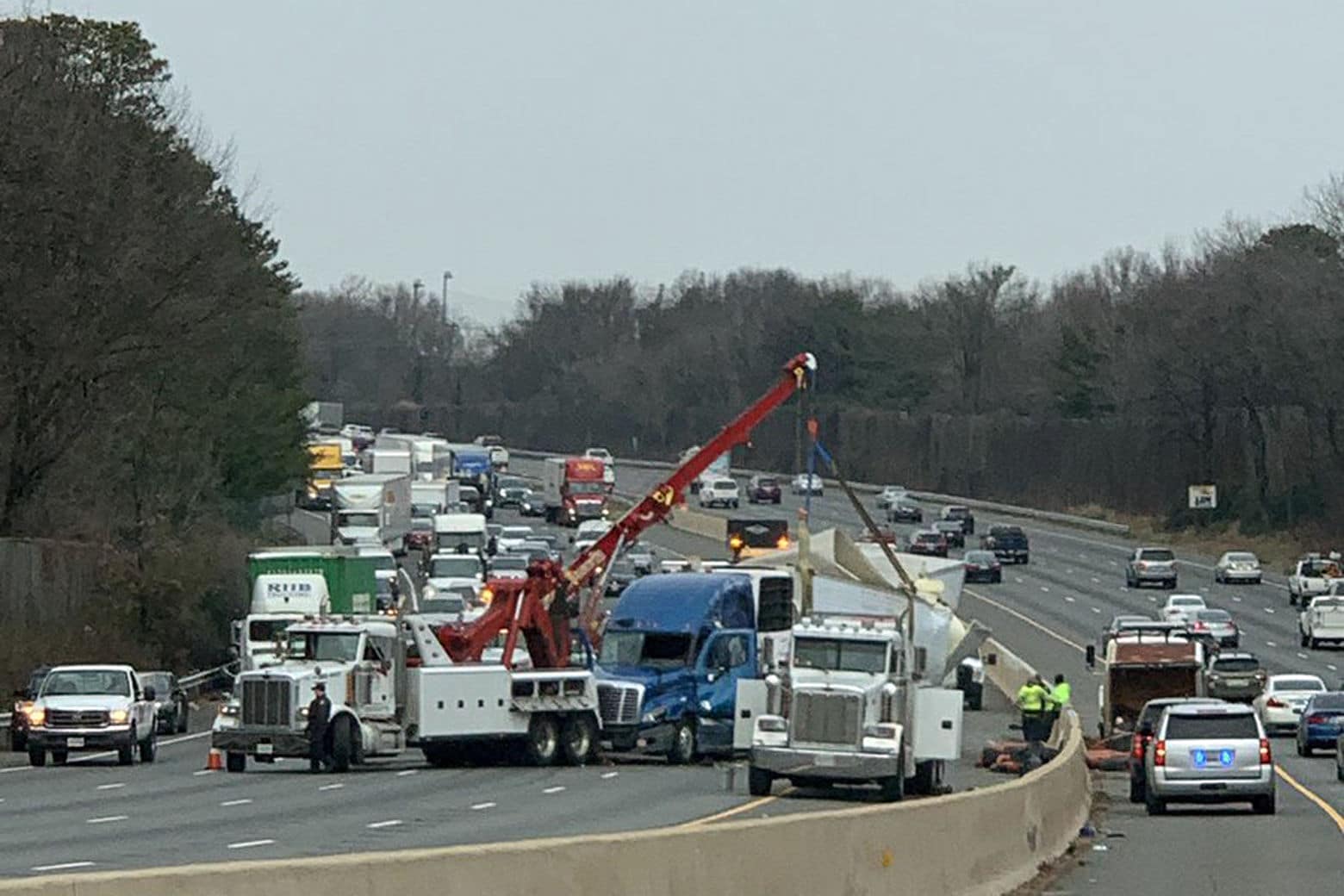 Officials worked for hours to clean up the crash site of an overturned tractor trailer Friday in Prince George's County, Maryland. (Courtesy John Barnhardt via Twitter)