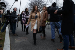 White House press secretary Sarah Huckabee Sanders walks off after speaking with reporters about the government shutdown outside the White House, Friday, Jan. 4, 2019, in Washington. (AP Photo/Evan Vucci)
