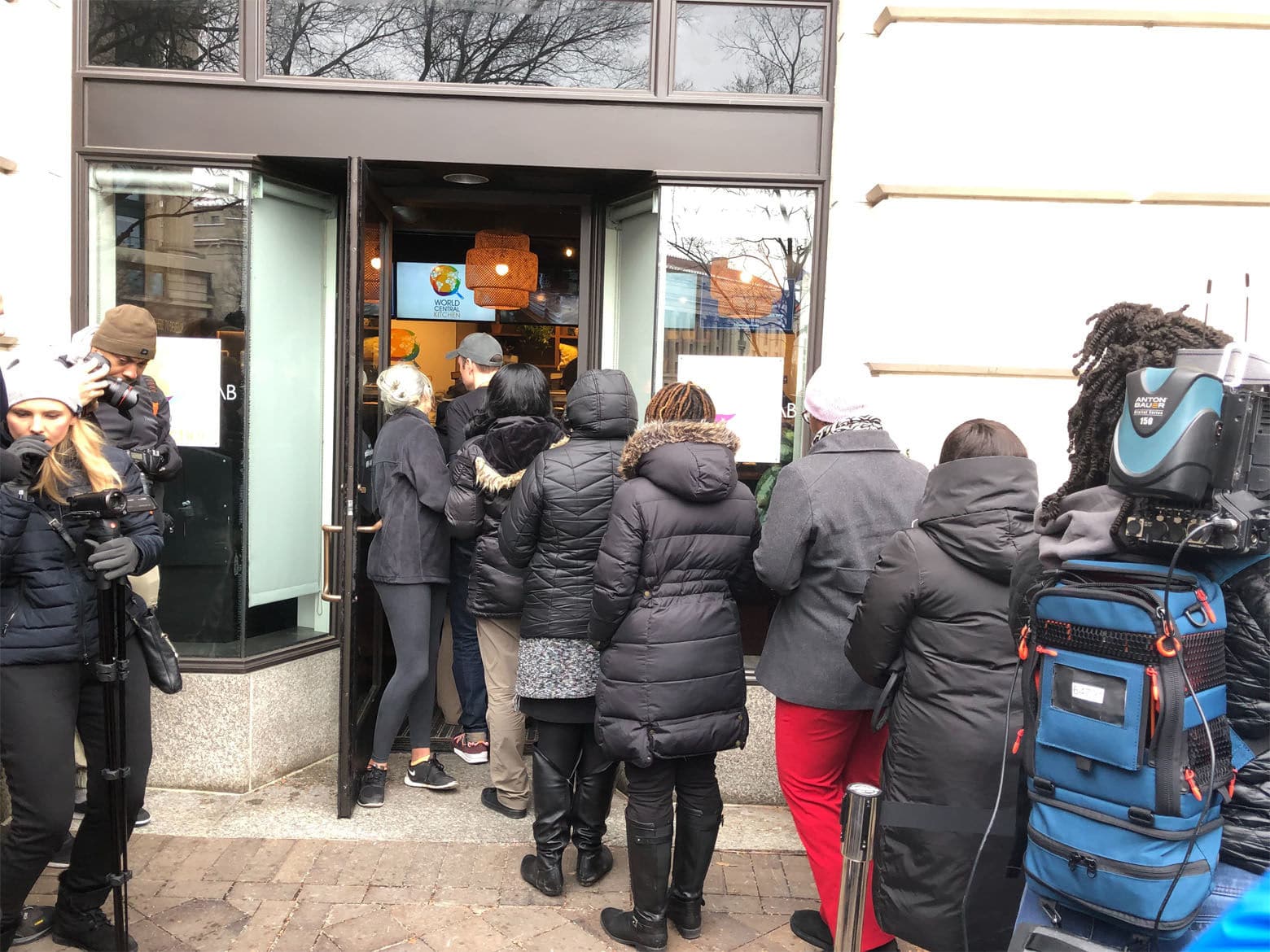 Federal employees and contractors who aren't getting paid because of the shutdown are lining up for free, hot, gourmet meals from the charity founded by Chef Andres. (WTOP/Kristi King)