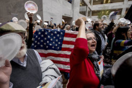 Furloughed government workers affected by the shutdown yell during a protest against the ongoing partial government shutdown on Capitol Hill in Washington, Wednesday, Jan. 23, 2019. (AP Photo/Andrew Harnik)