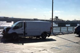 A van involved in the 14th Street Bridge crash Tuesday. (Authorities on the scene of a crash on the 14th Street Bridge on Tuesday. (Courtesy D.C. Fire and EMS))