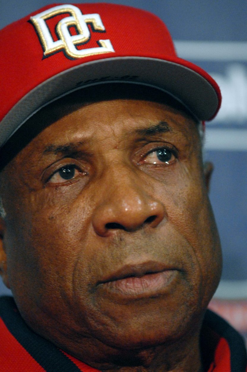 Frank Robinson, Hall of Famer and baseball's first black manager, dies at 83