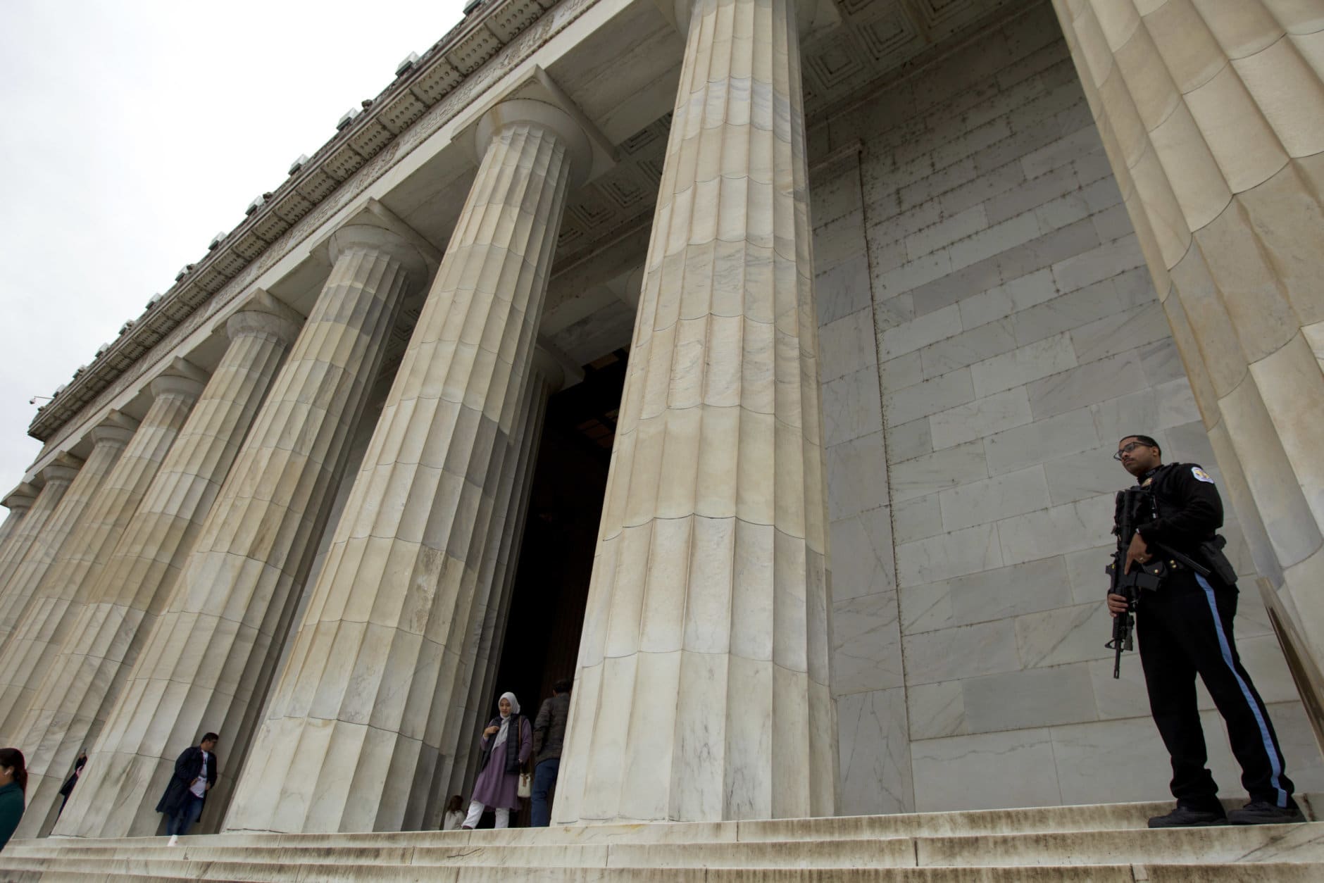 Park police officer patrol an area at Lincoln Memorial in Washington, Tuesday, Jan. 1, 2019, as a partial government shutdown stretches into its third week.  A high-stakes move to reopen the government will be the first big battle between Nancy Pelosi and President Donald Trump as Democrats come into control of the House.  (AP Photo/Jose Luis Magana)