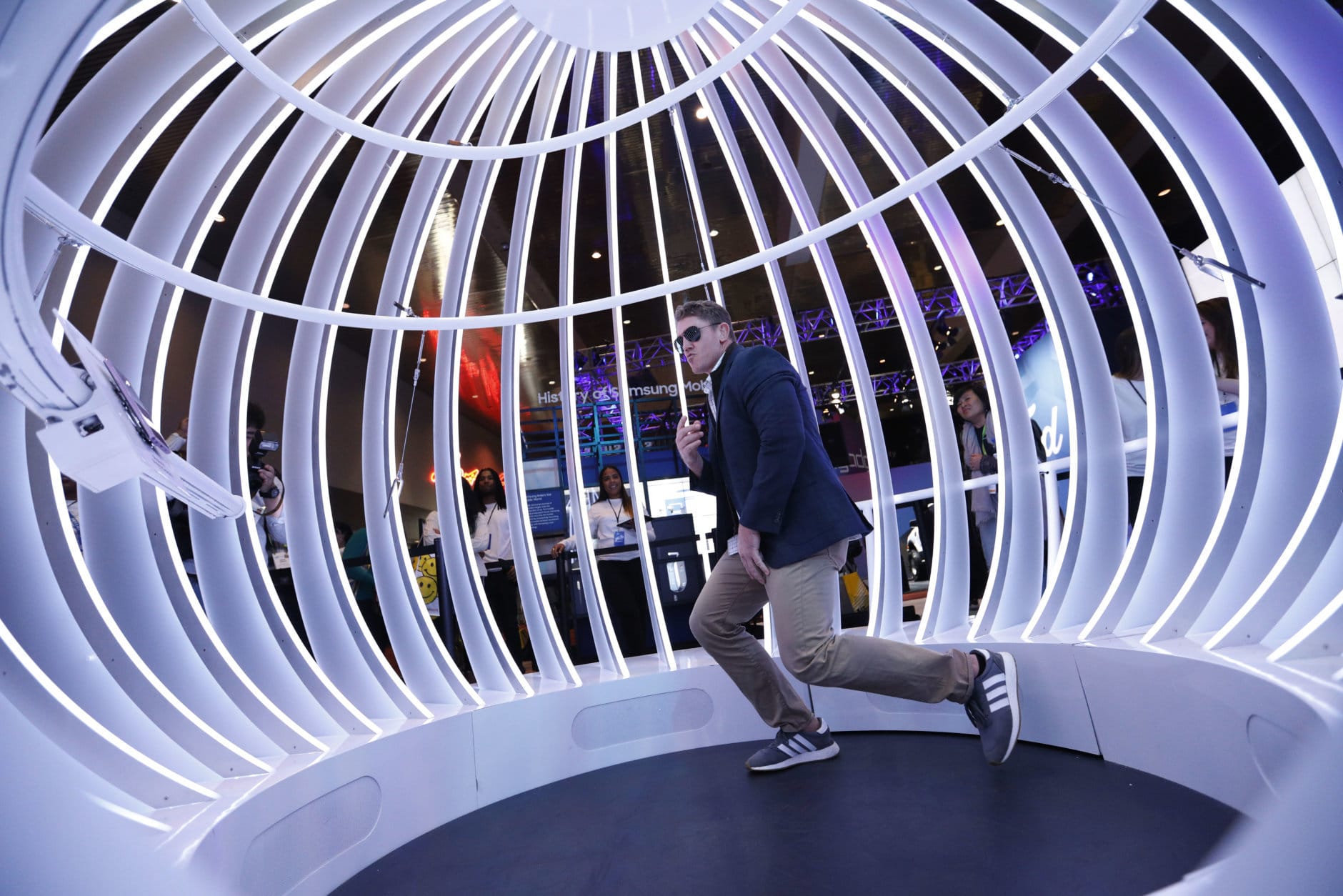 Greg Mason dances while having a video taken in a Samsung booth at CES International, Wednesday, Jan. 9, 2019, in Las Vegas. (AP Photo/John Locher)