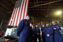 U.S. Coast Guardsmen and women, who missed their first paycheck a day earlier during the partial government shutdown, stand on a 45-foot response boat as they listen to their lieutenant during their shift at Sector Puget Sound base Wednesday, Jan. 16, 2019, in Seattle. They are part of a multi-mission, around-the-clock group charged with security and search and rescue missions. The Coast Guard is part of the U.S. Department of Homeland Security, which is unfunded during the partial government shutdown. (AP Photo/Elaine Thompson)