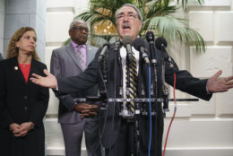 Rep. G.K. Butterfield, D-N.C., joined by House Majority Whip James Clyburn, D-S.C., center, and Rep. Debbie Wasserman Schultz, D-Fla., left, speaks during a news conference on Capitol Hill in Washington, Thursday, Jan. 17, 2019, following weekly Whip meeting. (AP Photo/Carolyn Kaster)