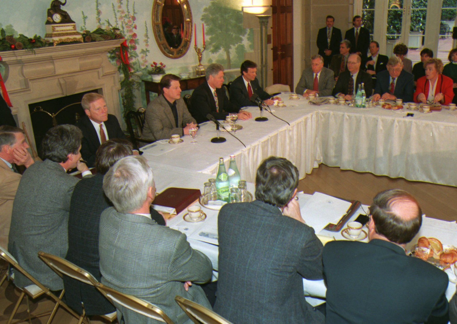 President Clinton speaks to a group of Democratic leaders gathered at Blair House across from the White House Saturday, Dec. 16, 1995 to discuss the federal budget. At the head table with Clinton are, from left, House Minority Leader Richard Gephardt of Missouri, Vice President Al Gore and Senate Minority Leader Thomas Daschle of South Dakota. Parts of the federal government were ordered shut down today as President Clinton blamed the Republican Congress for attempting to force unacceptable cuts in programs affecting the lives of children, the elderly and the poor.  (AP Photo/J. Scott Applewhite)