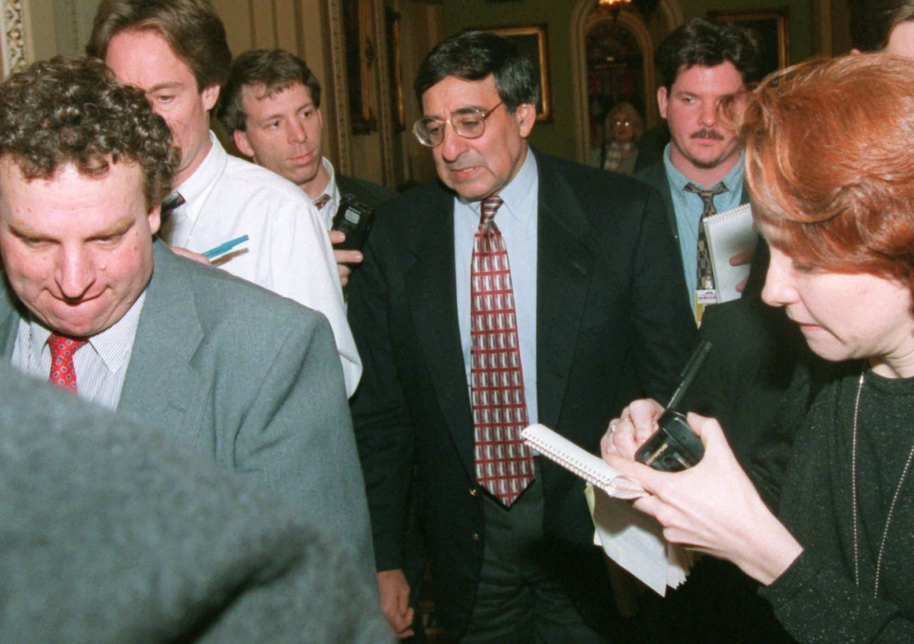 White House Chief of Staff Leon Panetta walks through the Capitol amid reporters Thursday Dec. 21, 1995 after budget talks broke up for the day. Bipartisan budget talks sprang back to life Thursday, but Democrats threatened to cut them off again if Republicans don't swiftly send President Clinton a bill ending the six-day government shutdown.(AP Photo/Wilfredo Lee)