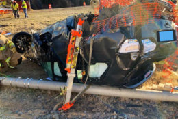 One person is in a hospital after their vehicle went over a bridge on Interstate 66 Monday morning. (Courtesy Arlington County Fire Department)