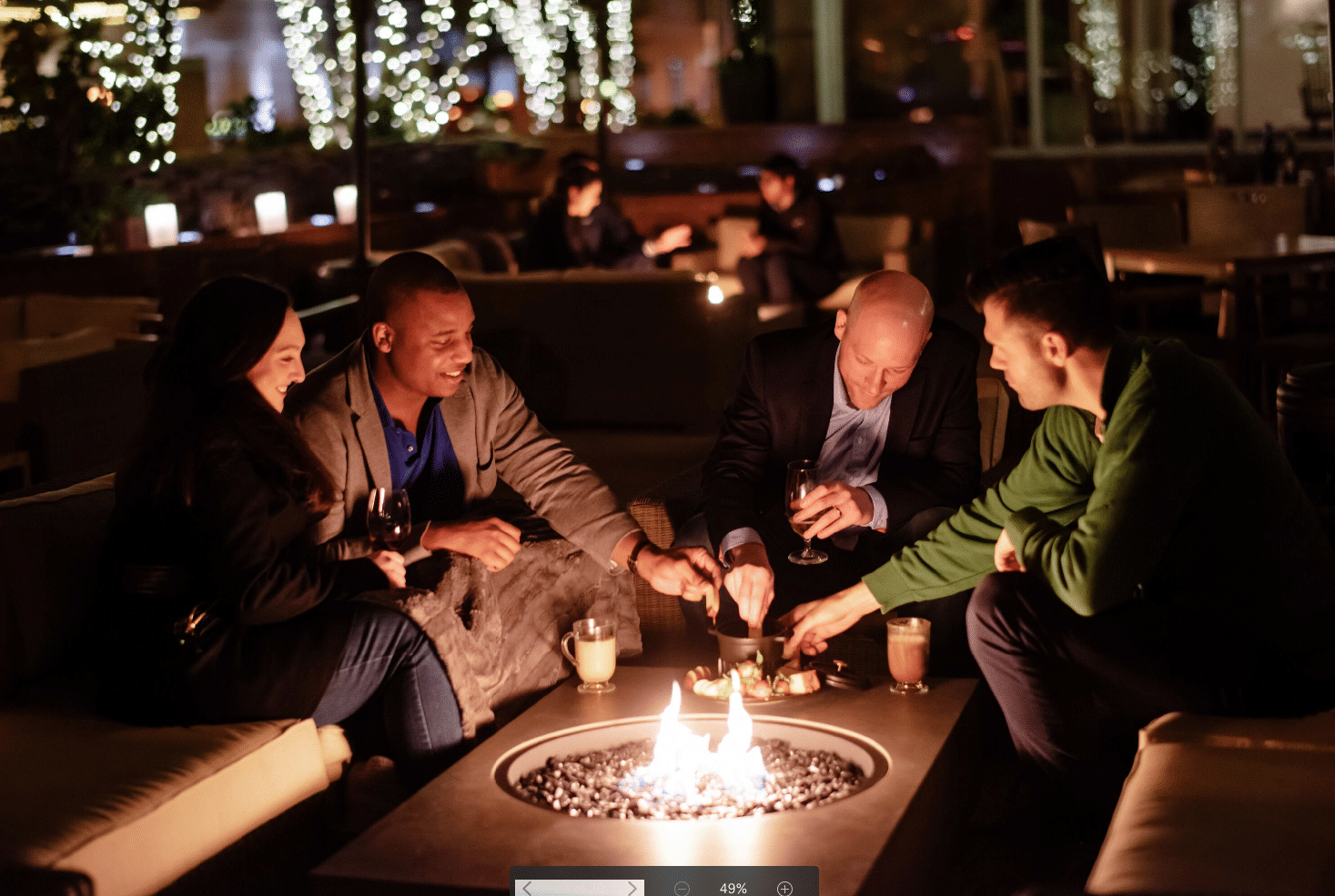 The new outdoor space, with fountain, is a sunken garden with fire pits and comes with blankets for guests to stay warm, and fondue to make it winter-cozy. (Courtesy Blue Duck Tavern)