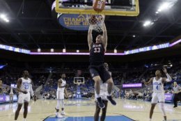 Belmont center Nick Muszynski (33) dunks against UCLA during the second half of an NCAA college basketball game Saturday, Dec. 15, 2018, in Los Angeles. (AP Photo/Marcio Jose Sanchez)