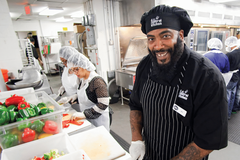 Earl Pass, 44, is a baker at D.C. Central Kitchen and a graduate of the nonprofit's culinary job training program. D.C. Central Kitchen's culinary job training program equips unemployed, underemployed and previously incarcerated individuals with the skills they need to work in restaurants, hotels, hospitals and more. (Courtesy D.C. Central Kitchen)