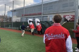 In order to make the cut, people auditioning have to run a 40-yard dash and hold their own in two races from center field to first base. (WTOP/Melissa Howell)
