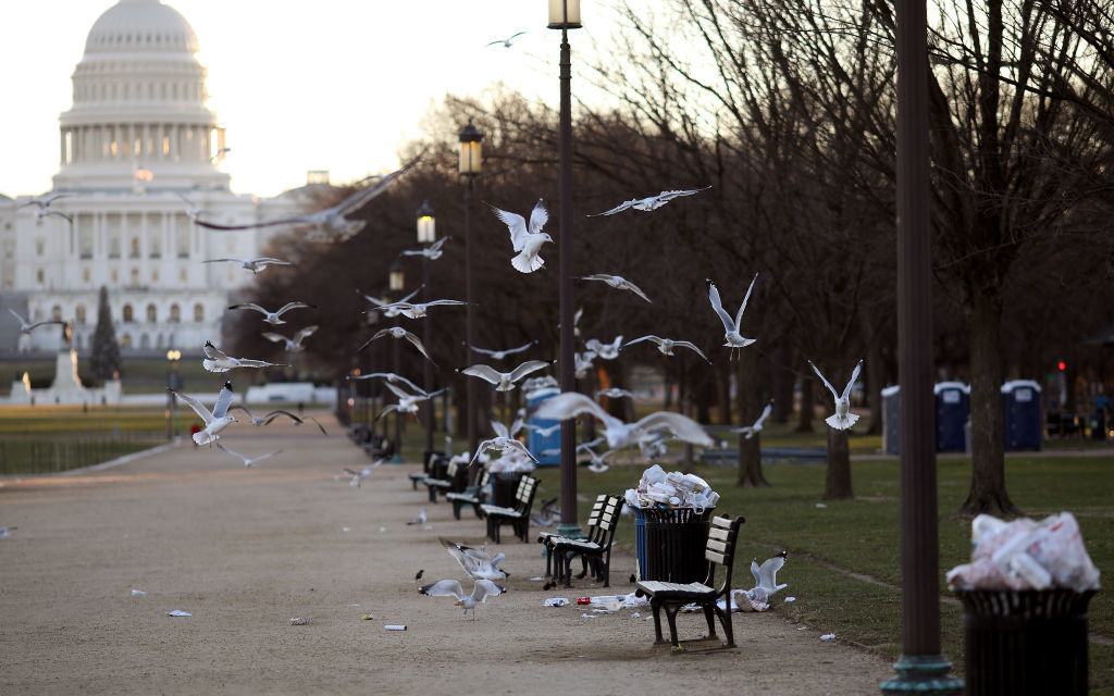 WASHINGTON, DC - DECEMBER 24:  Trash begins to accumulate along the National Mall due to a partial shutdown of the federal government on December 24, 2018 in Washington, DC. The partial shutdown will continue for at least a few more days as lawmakers head home for the holidays as Democrats and the Trump administration cannot agree on an amount of funding for border security. (Photo by Win McNamee/Photo by Win McNamee/Getty Images)