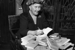 circa 1965:  British mystery author Agatha Christie (1890-1976) autographing French editions of her books.  (Photo by Hulton Archive/Getty Images)