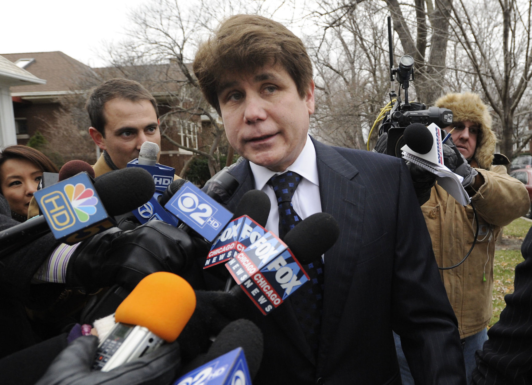 Former Illinois Governor Rod Blagojevich heads to federal court for his sentencing hearing in Chicago, Tuesday, Dec. 6, 2011.   Blagojevich was convicted earlier this year on 18 corruption counts, including trying to auction off President Barack Obama's old U.S. Senate seat.   (AP Photo/Paul Beaty)