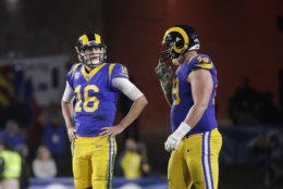 Los Angeles Rams quarterback Jared Goff and offensive tackle Rob Havenstein stand on the field during an NFL football game against the Philadelphia Eagles Sunday, Dec. 16, 2018, in Los Angeles . (AP Photo/Jae C. Hong)