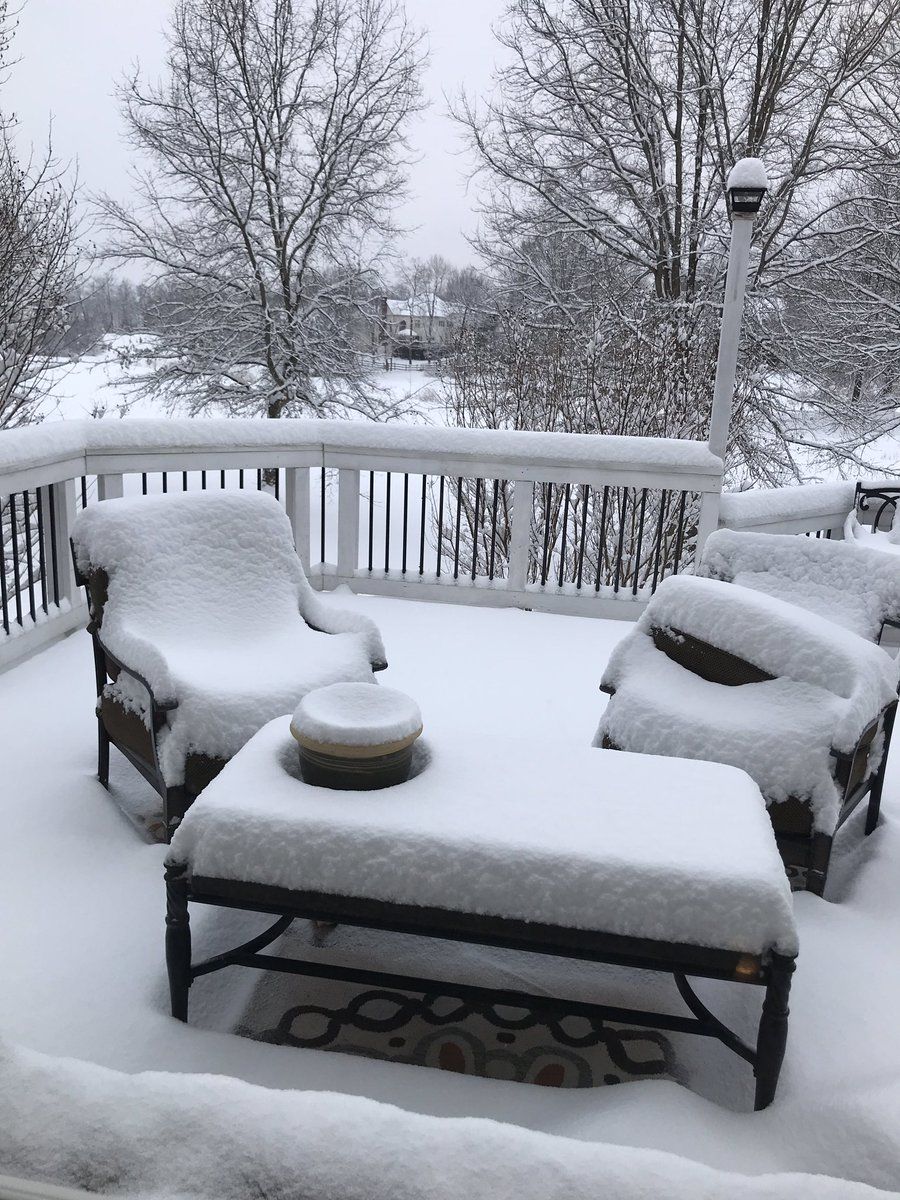 Snow blankets patio furniture in Gainsville, Va. (Courtesy of Heidi Rhodes via Twitter)