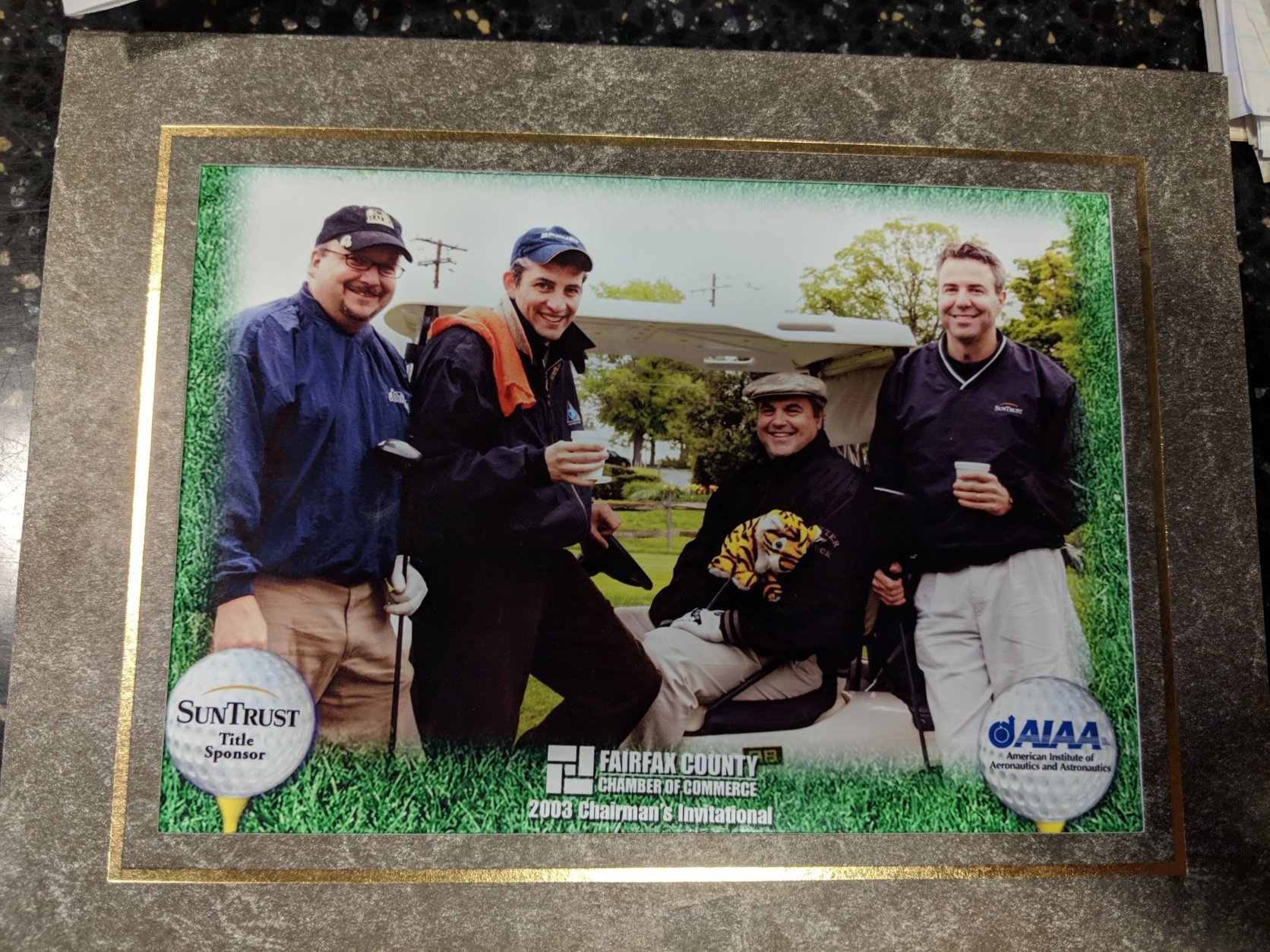 This is a snapshot from the 2003 Fairfax County Chamber of Commerce Chairman's Invitational. As everyone knows, it's where WTOP News Director Mike McMearty (far left) and General Manager Joel Oxley (far right) shot a 51 and 50, respectively. Both later turned down invitations to join the PGA Tour. Also pictured here are two guys who are not my bosses and are, therefore, probably average golf players. (WTOP/Jack Pointer)