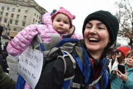 Elisabeth traveled with her daughter, Penelope, from Atlanta to join their first Women’s March in D.C. (WTOP/Alejandro Alvarez)