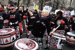 Drummers with Batala Washington, an “all-women Afro-Brazilian band that plays Samba-Reggae rhythms,” played non-stop for the duration of the march near Freedom Plaza. (WTOP/Alejandro Alvarez)