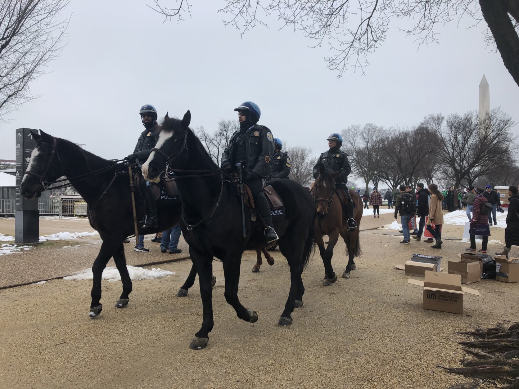 Park Police bundled up on a cold wet Friday for the annual March for Life. (WTOP/Max Smith)
