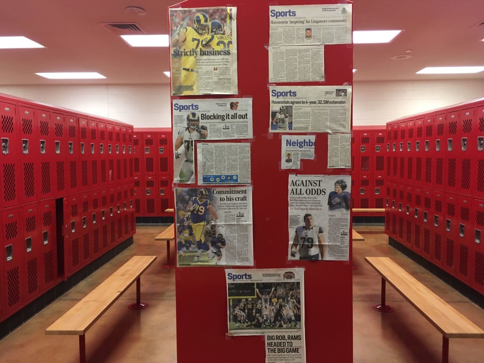 Press clippings about Havenstein in the locker room at Linganore High School. (WTOP/Noah Frank)
