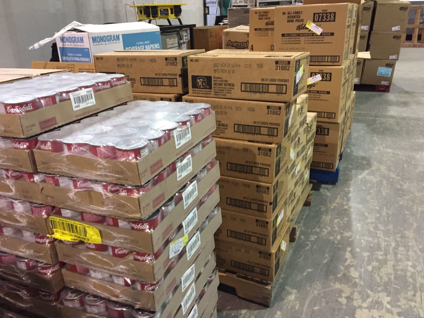 The food donated today, stacked several pallets high, is being distributed to more than a dozen food pantries around Prince George’s County, which will then work with furloughed feds who have reached out for help to make sure they can eat. (WTOP/John Domen)