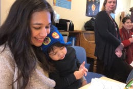 Vidisha Parasram of Alexandria, Virginia, with her son Ayan. She's an investigator and the director of incident screening at the Chemical Safety Board. "There was just an incident in Houston this past weekend, that we're not even considering deploying to" to investigate, Parasram told Sens. Tim Kaine and Mark Warner. (WTOP/Kristi King)