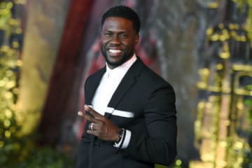 FILE - In this Dec. 11, 2017 file photo, Kevin Hart arrives at the Los Angeles premiere of "Jumanji: Welcome to the Jungle" in Los Angeles. Hart will host the 2019 Academy Awards, fulfilling a lifelong dream for the actor-comedian. Hart announced Tuesday, Dec. 4, 2018, his selection in an Instagram statement and the Academy of Motion Picture Arts and Sciences followed up with a tweet that welcomed him "to the family." (Photo by Jordan Strauss/Invision/AP, File)