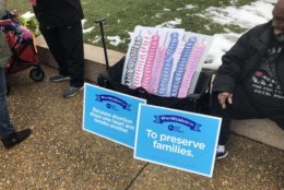 Activists had their signs ready as Friday's March for Life got underway. (WTOP/Max Smith)