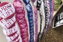 Buttons and other memorabilia were available as Friday's March for Life got underway. (WTOP/Max Smith)
