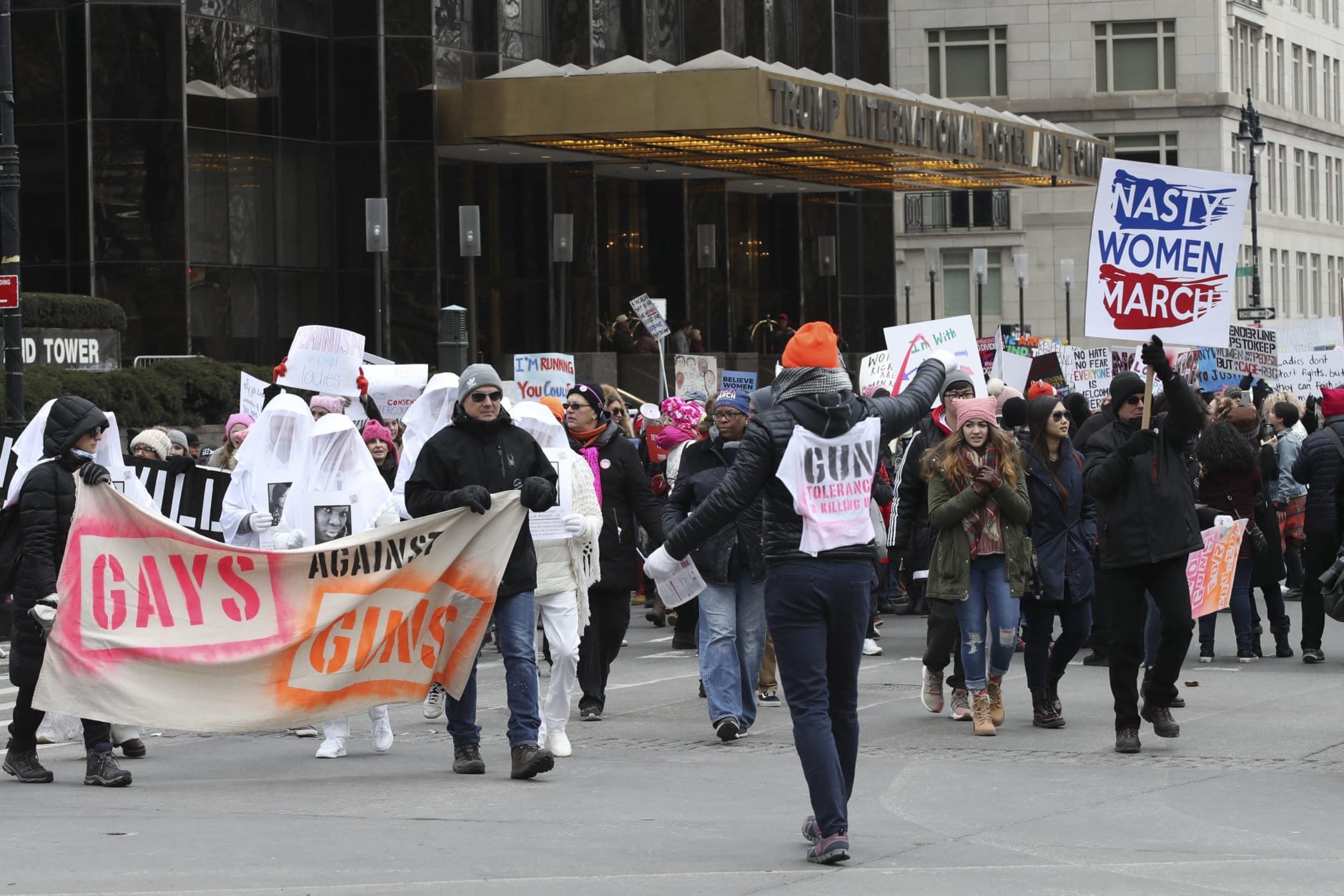 Demonstrators march past the Trump International Hotel and Tower during the Women's March Alliance, Saturday, Jan. 19, 2019, in New York. (AP Photo/Mary Altaffer)