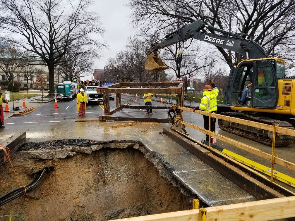 Crews working on 17th Street NW to repair a hole in the roadway. (Courtesy DC Water)